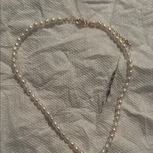Elegant Pearl Necklace with Gold Accents